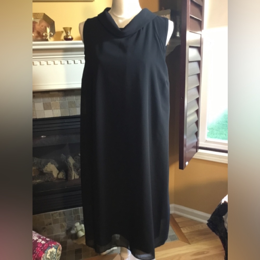 Chico’s black cocktail dress with sheer overlay. Chico’s size 2.5= size 14